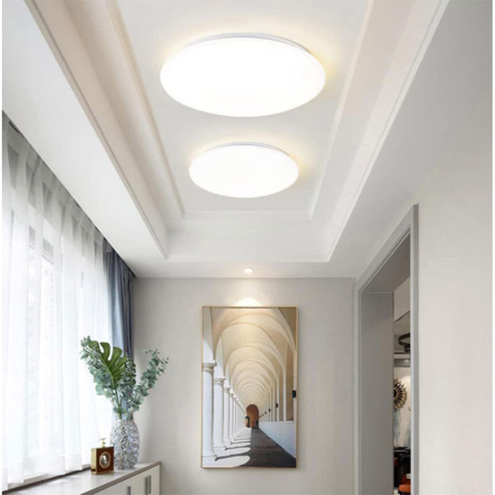 Plafoniera LED tonda con scocca liscia e regolazione CCT (18W/24W/36W) - ambraled