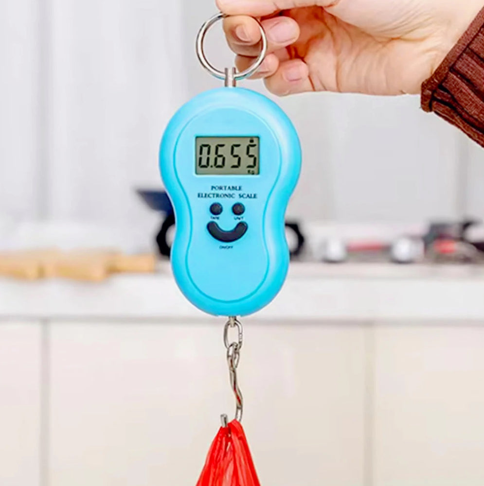 Bilancia portatile LCD – 50kg con gancio per valigie - ambraled