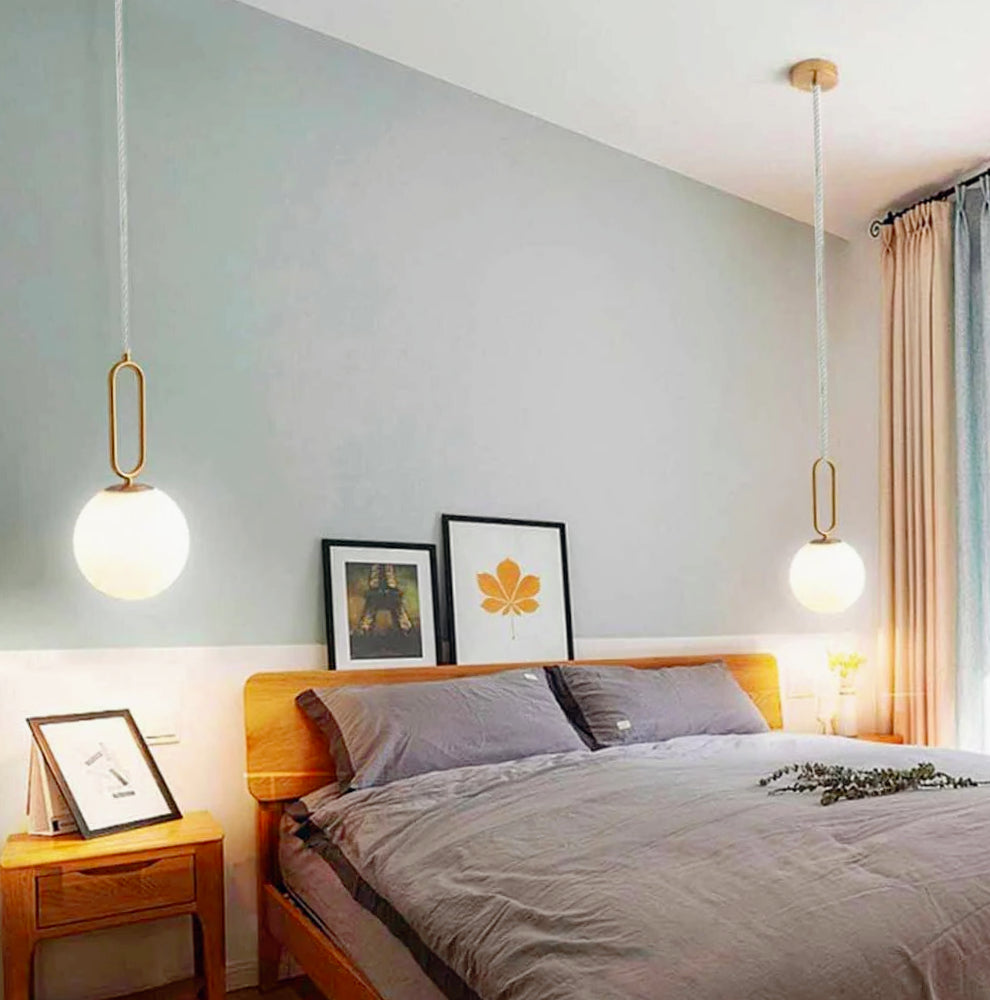 Lampadario minimalista con ovale in metallo bronzo e sfera G9 - ambraled