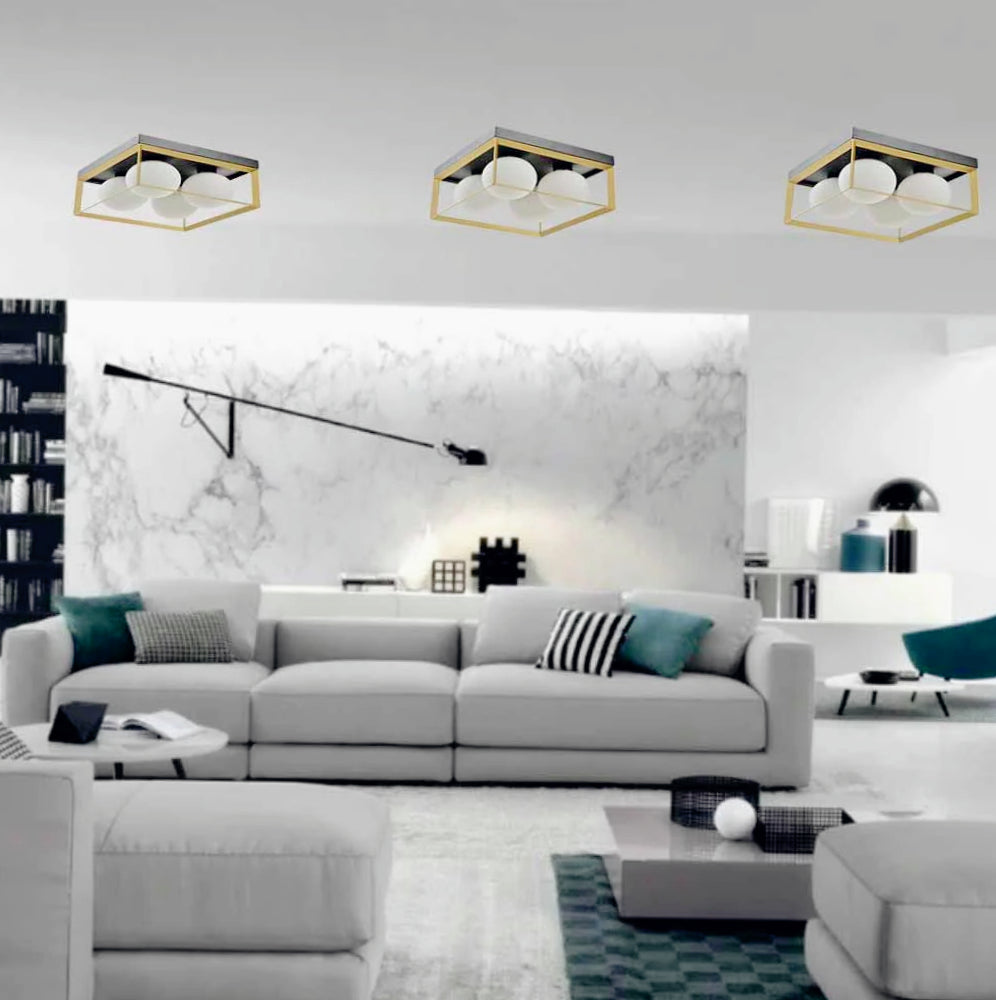 Plafoniera minimalista in metallo nero e bronzo con 4 sfere opache - attacco G9 - ambraled