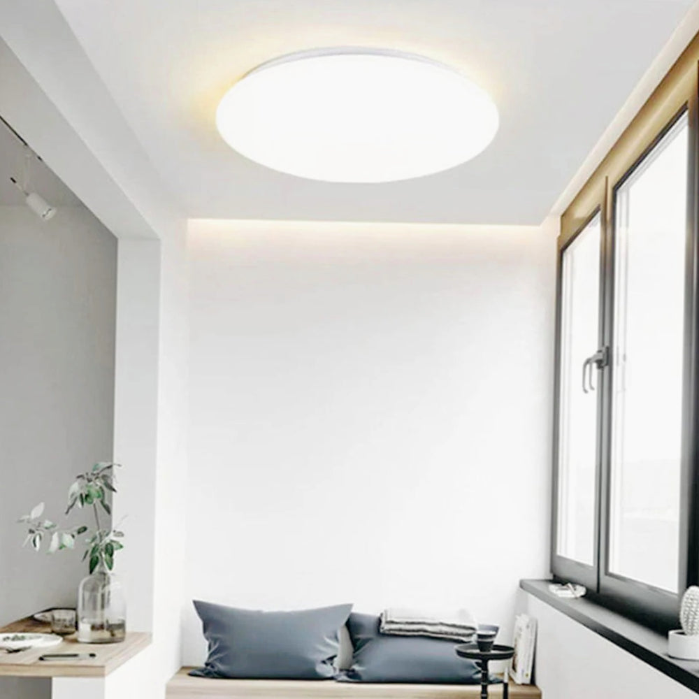 Plafoniera LED tonda con scocca liscia e regolazione CCT (18W/24W/36W) - ambraled