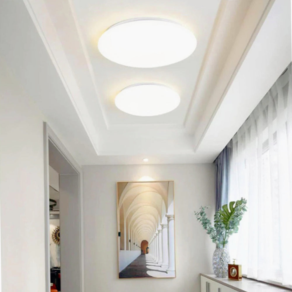 Plafoniera LED tonda con scocca liscia e regolazione CCT (18W/24W/36W) - ambraled